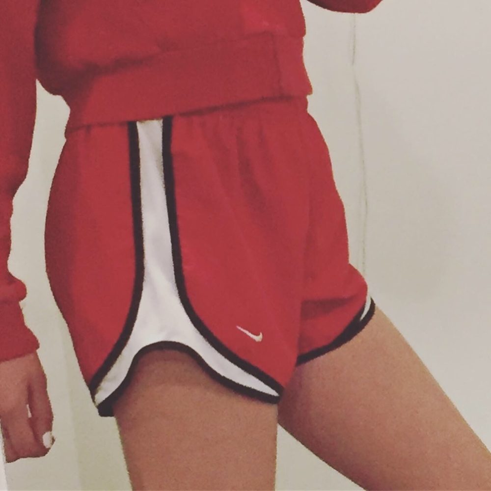 Red an black nike shorts size M
